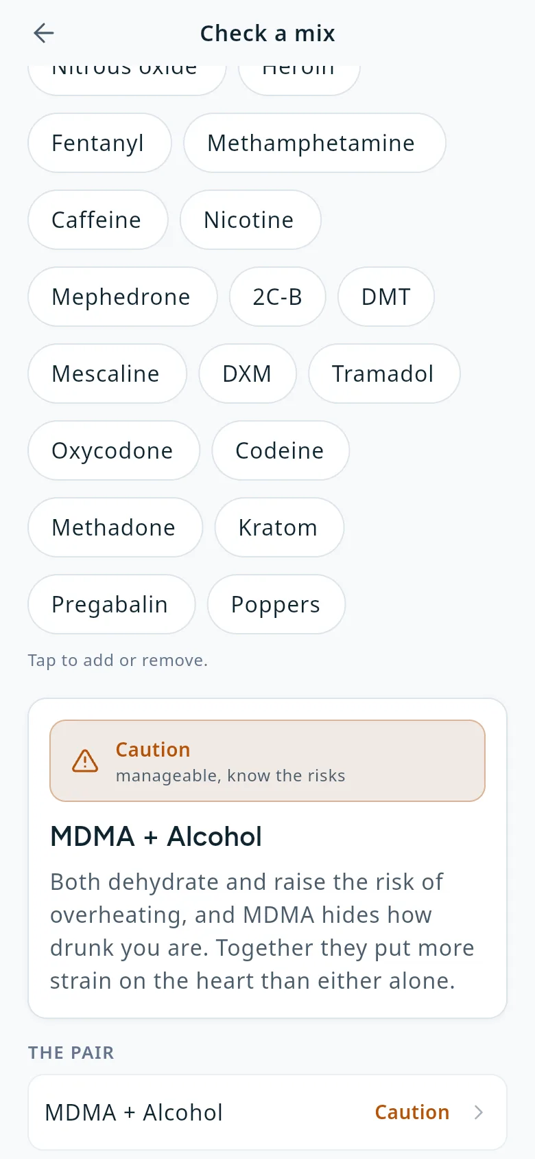 The mix check with MDMA and alcohol chosen. The pair is rated Caution, manageable if the risks are known: both dehydrate and raise the risk of overheating, MDMA hides how drunk you are, and together they put more strain on the heart than either alone.